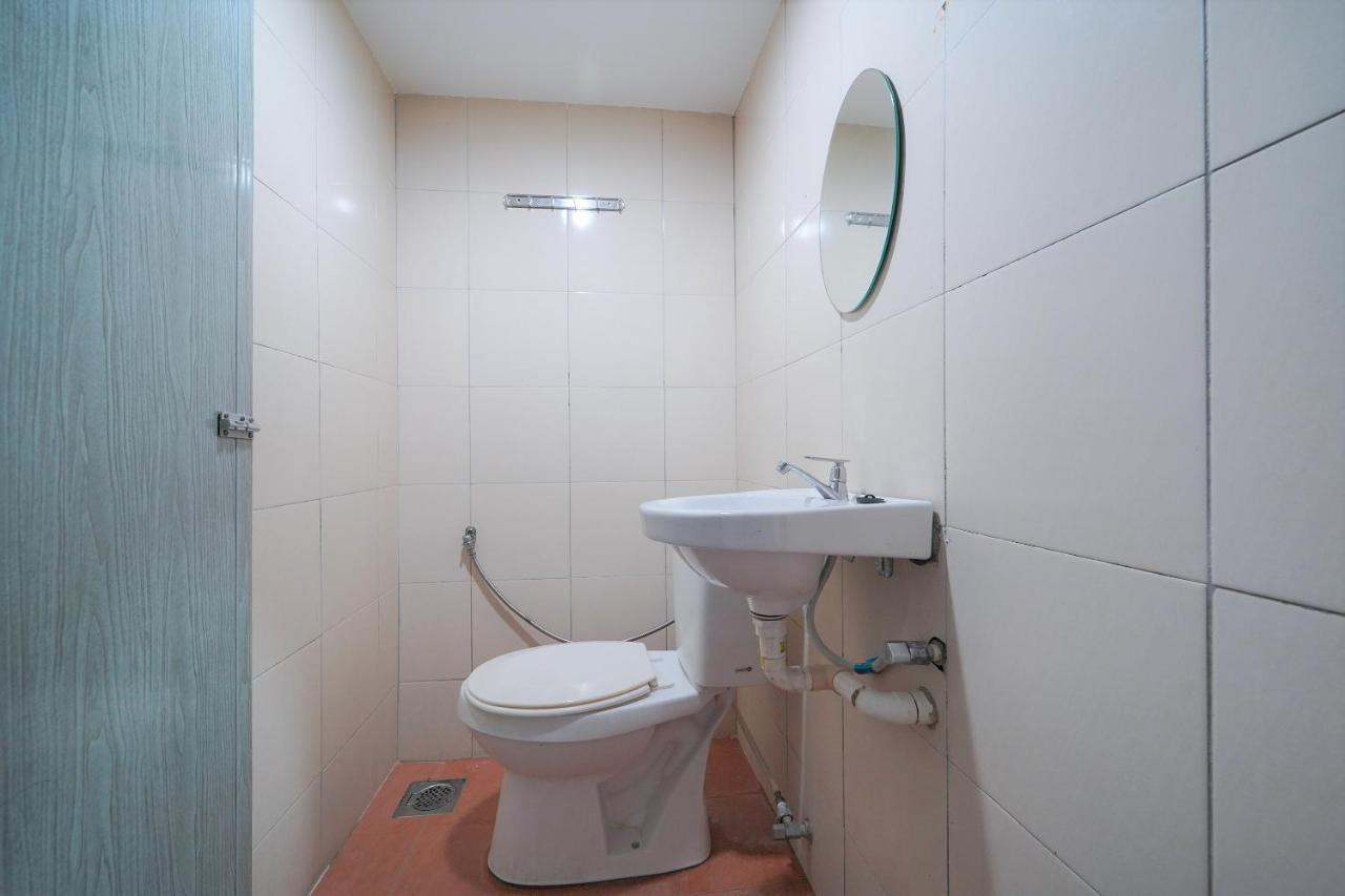 Oyo 89850 Mutiara Motel Куах Экстерьер фото