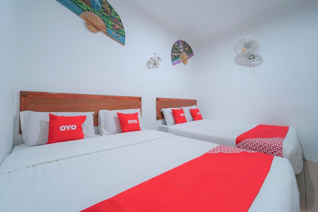 Oyo 89850 Mutiara Motel Куах Экстерьер фото