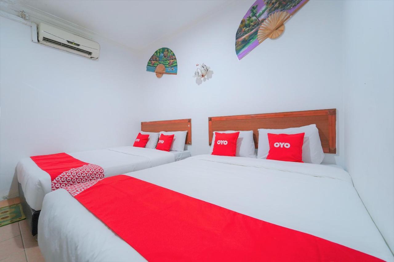 Oyo 89850 Mutiara Motel Куах Экстерьер фото